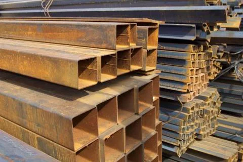 Metal profile pipe of rectangular cross section in packs at the warehouse of Stock-Fotos