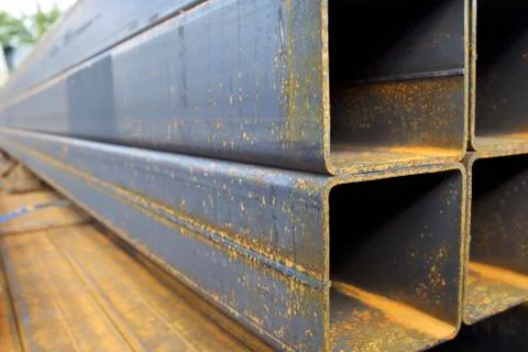 Metal profile pipe of rectangular cross section in packs at the warehouse of Stock-Fotos