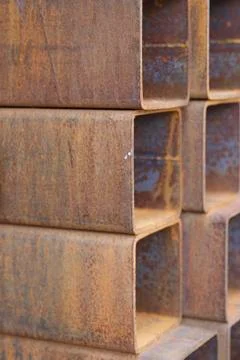 Metal profile pipe of rectangular cross section in packs at the warehouse of Stock-Fotos