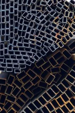 Metal profile pipe of rectangular cross section in packs at the warehouse of Stock-Fotos