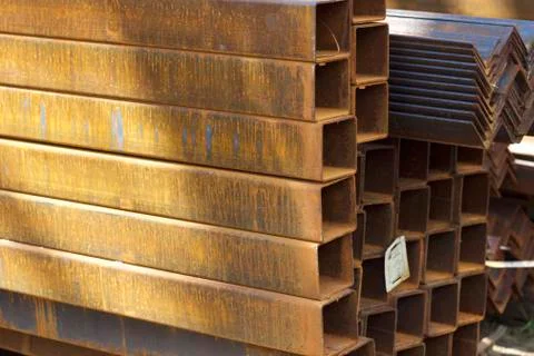 Metal profile pipe of rectangular cross section in packs at the warehouse of Stock-Fotos