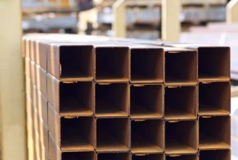 Metal profile pipe of rectangular cross section in packs at the warehouse of Stock-Fotos