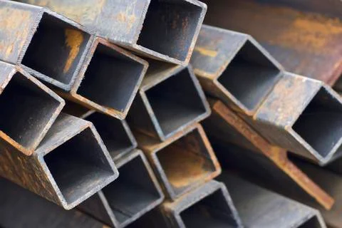 Metal profile pipe of rectangular cross section in packs at the warehouse of Stock-Fotos