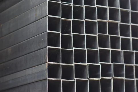Metal profile pipe of rectangular cross section in packs at the warehouse of Stock-Fotos