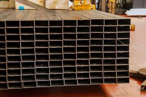 Metal profile pipe of rectangular cross section in packs Stock Photos