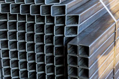 Metal profile pipe of rectangular cross section in packs Stock Photos