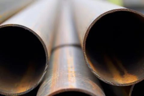 Metal profile pipe of round section in packs at the warehouse of metal produc Stock-Fotos