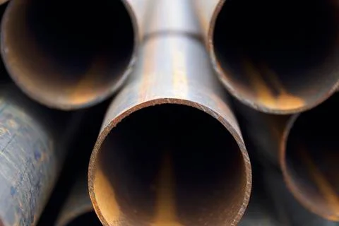 Metal profile pipe of round section in packs at the warehouse of metal produc Stock-Fotos