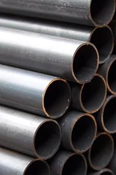 Metal profile pipe of round section in packs at the warehouse of metal produc Stock-Fotos