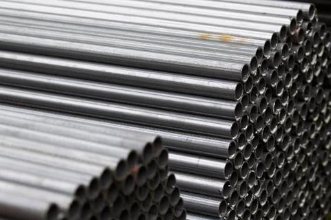 Metal profile pipe of round section in packs at the warehouse of metal produc Stock-Fotos