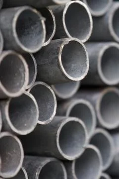Metal profile pipe of round section in packs at the warehouse of metal produc Stock-Fotos