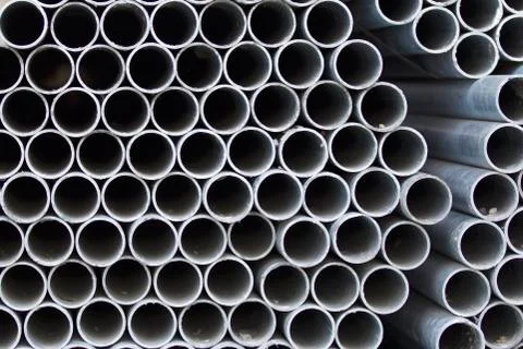 Metal profile pipe of round section in packs at the warehouse of metal produc Stock-Fotos