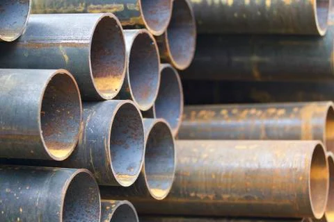 Metal profile pipe of round section in packs at the warehouse of metal produc Stock-Fotos