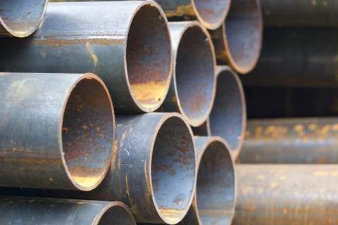 Metal profile pipe of round section in packs at the warehouse of metal produc Stock-Fotos