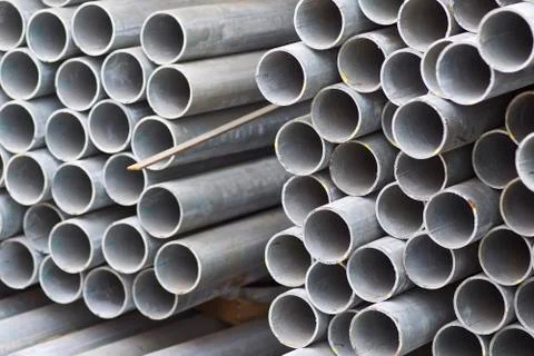 Metal profile pipe of round section in packs at the warehouse of metal produc Stock-Fotos