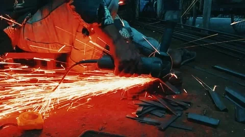 A metal project in a workshop with sparks flying everywhere in a video Stockbeeldmateriaal 332455818