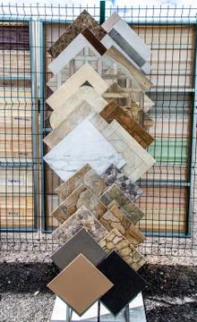 On a metal rack is ceramic tile in the store. repair in the house. Belarus vi Stock Photos
