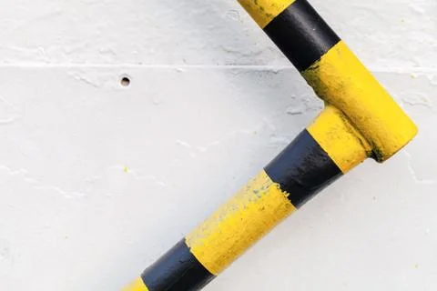 Metal railing with caution pattern Stockfoto's