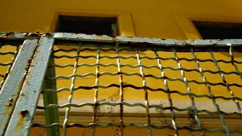 Metal railing with crossed texture seen ... | Stock Video | Pond5