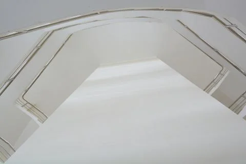 Metal railing of a multi-level modern staircase. Perspective.	 Stock Photos