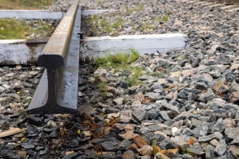 Metal railway rail. A piece of iron rail. Stock Photos