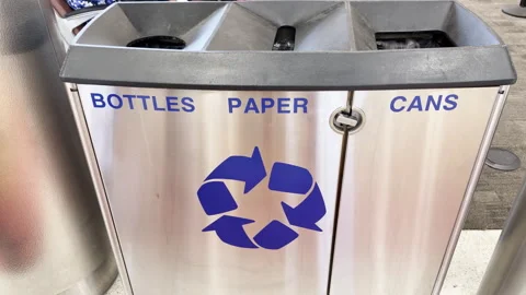Metal recycling bin with three separated compartments offer convenience. Stock Footage 344907020