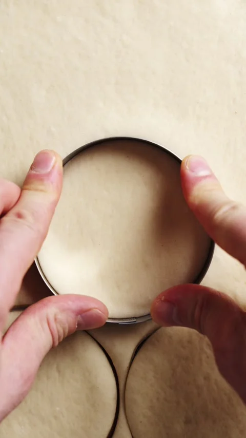 Metal ring cutter shapes hand pie dough. Stock Footage 341429468