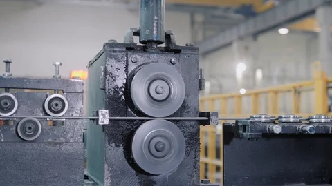Metal rollers of various shape level grey metal rebar rod Video stock 124003067