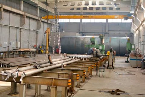 Metal rolling line, large workshop, steel pipes Фото