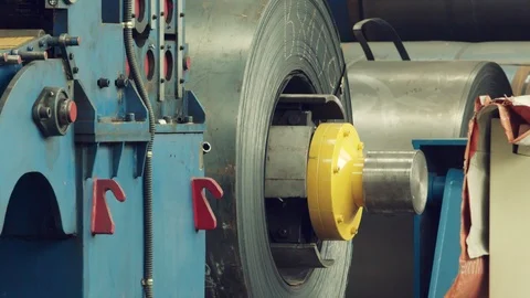 Metal rolls of roll forming machine at a metalwork manufacturing, Stock Footage 121191020
