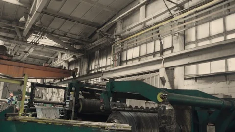 Metal rolls of roll forming machine at a metalwork manufacturing, Stock Footage 121191288