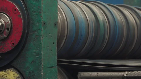 Metal rolls of roll forming machine at a metalwork manufacturing, Stock Footage 121191339