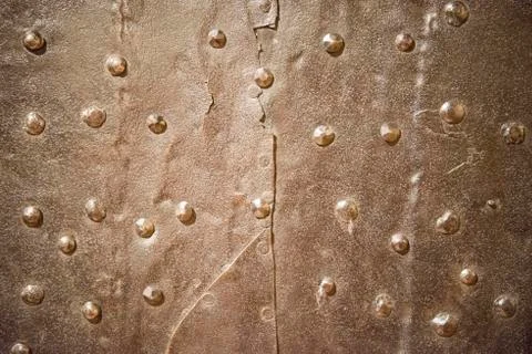 Metal rusty background with rivets Stock Photos