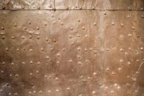 Metal rusty background with rivets Stock Photos