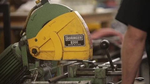 Metal saw cuts through pipe Video stock 82441832