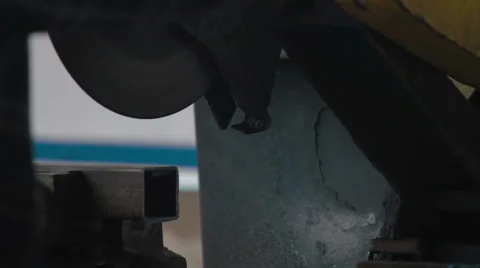 Metal saw cutting steel billet Stock Footage 59576740