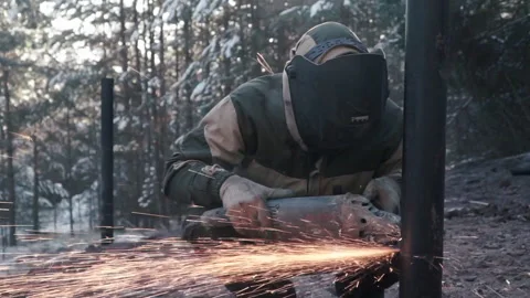 Metal sawing. Clip. Complex work with special equipment in the open. Stock Footage 233833348