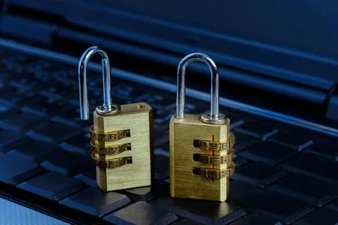 Metal security lock with password on computer keyboard Foto stock