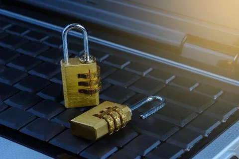 Metal security lock with password on computer keyboard Foto stock