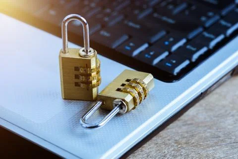 Metal security lock with password on computer keyboard Foto stock