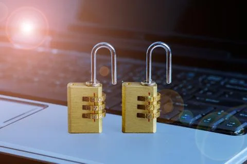 Metal security lock with password on computer keyboard Foto stock