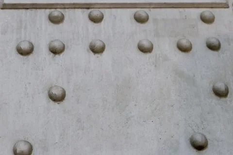 Metal set bolt on the surface gray part of the powerful pattern design grunge 写真素材