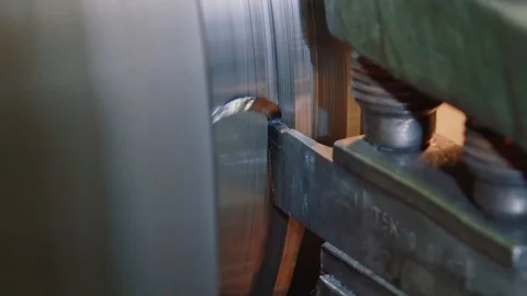 Metal shaving process on lathe machine, close-up. Old machine at factory Stock Footage 115428108