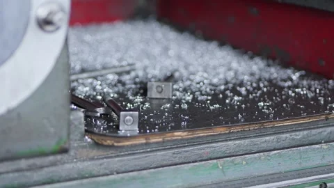 Metal Shavings on CNC Work Surface Workshop Close Up Видео 334078991