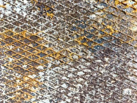 Metal sheet texture with diamonds, rust and white paint Foto stock