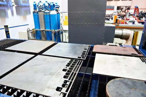 Metal sheets on laser cutting machine Stock Photos