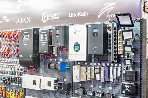 Metal shelf with electronics assembly tools and devices, including circuit .. Stock Photos