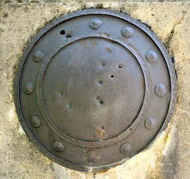 Metal shield pierced Foto stock