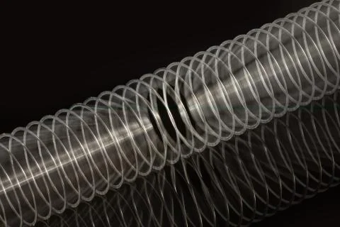 Metal silver spring, bouncing. Motion blur Stock Photos