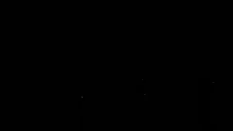 Metal sparks on Black Background Stock Footage 77779112